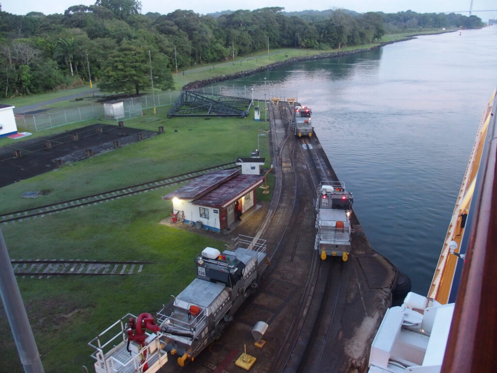 Mules getting ready to pull the ship, Panama Canal